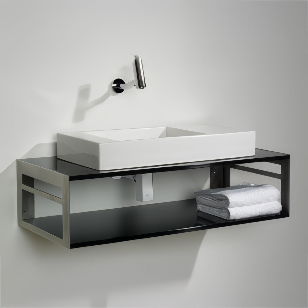 Rectangular White Porcelain Vessel Basin on a sleek Laminated Black Floating Countertop &amp; Shelf Unit with built-in towel rails