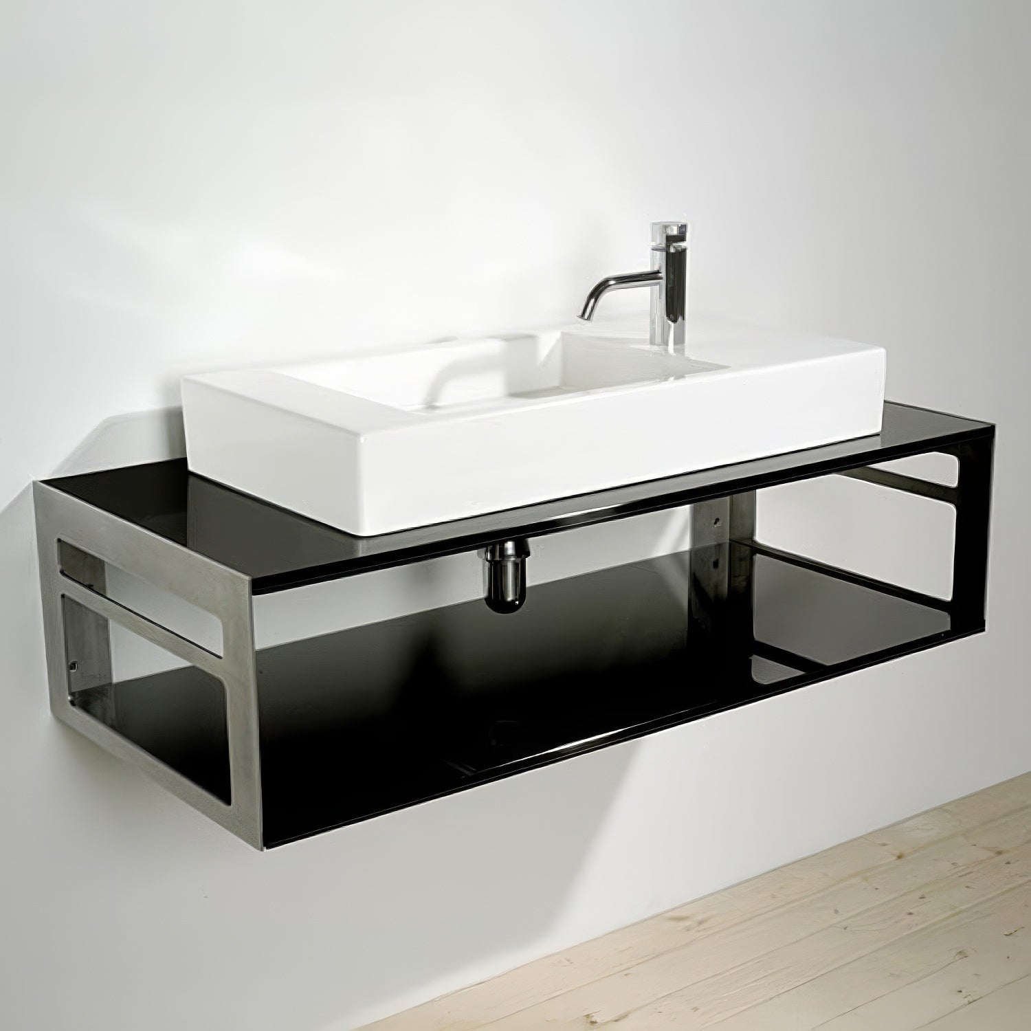 Rectangular White Porcelain Vessel Basin on a sleek Laminated Black Floating Countertop & Shelf Unit with built-in towel rails