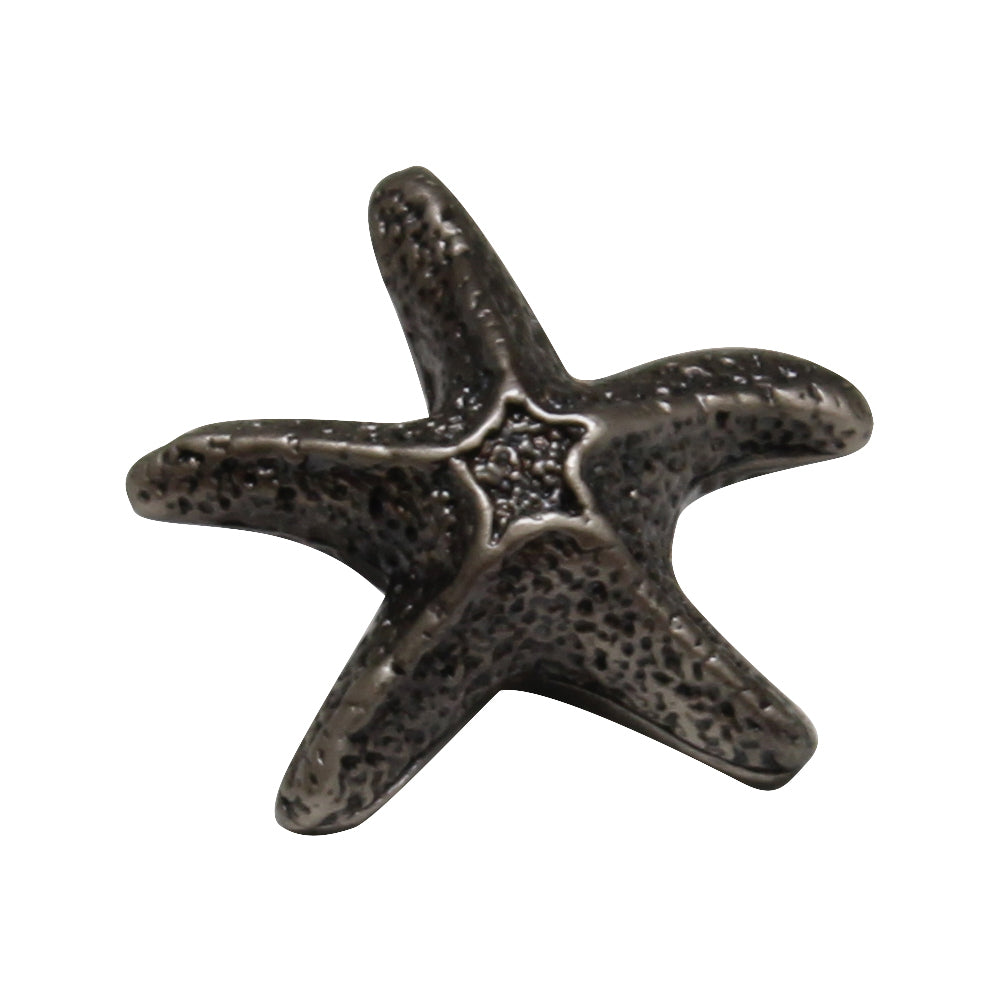 Solid brass starfish-shaped knob.