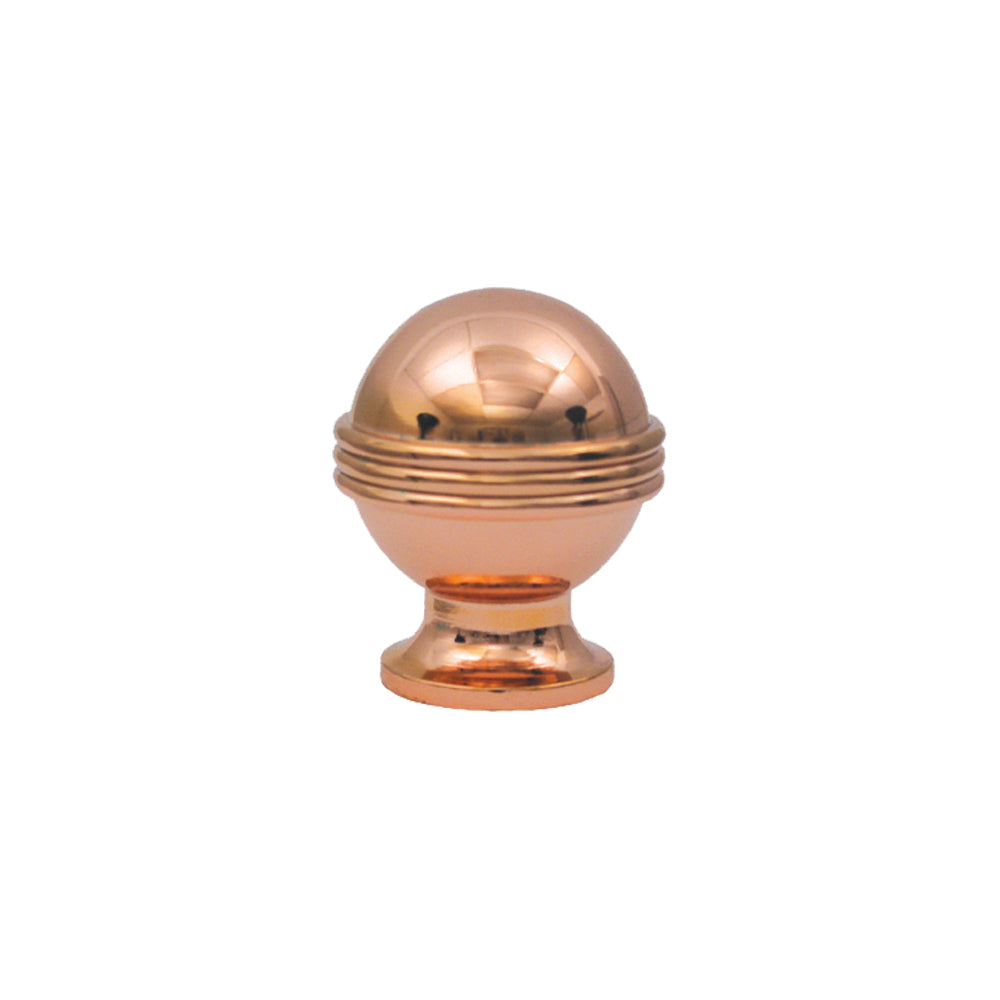 Sphere-shaped crystal knob with gold base.