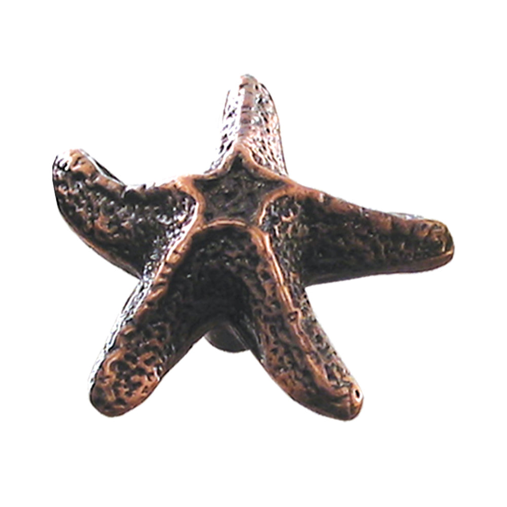 Solid brass starfish-shaped knob.
