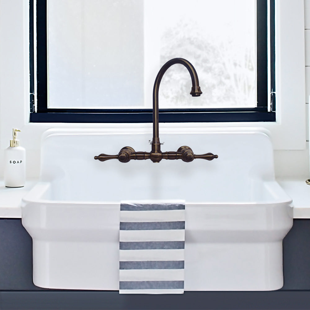 Wall Mount Faucet with a Long Gooseneck Swivel Spout, Lever Handles and Solid Brass Side Spray