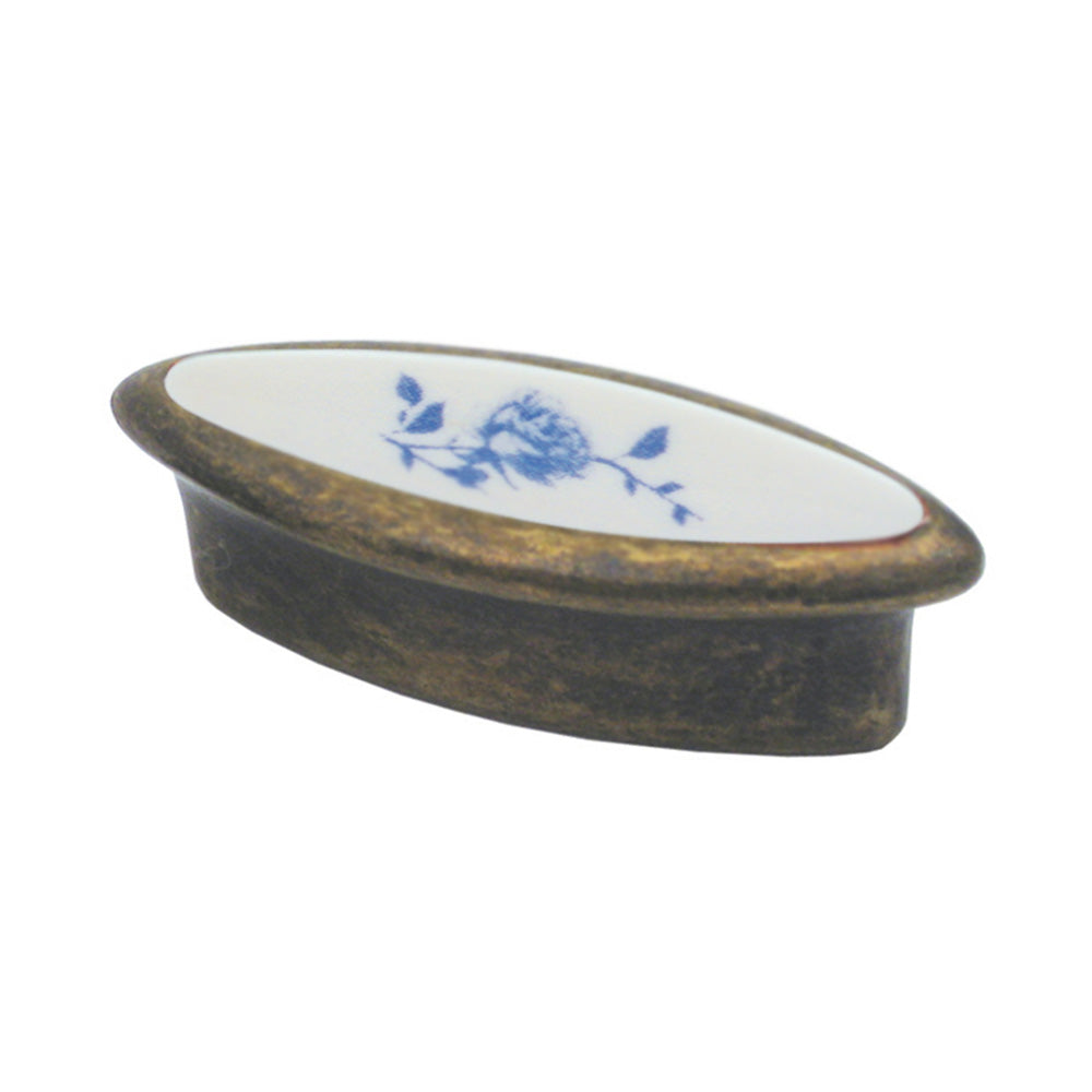 Oval-shaped solid brass knob with a porcelain center and painted rose detail.